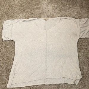 Cream colored v neck t shirt from Anthropologie